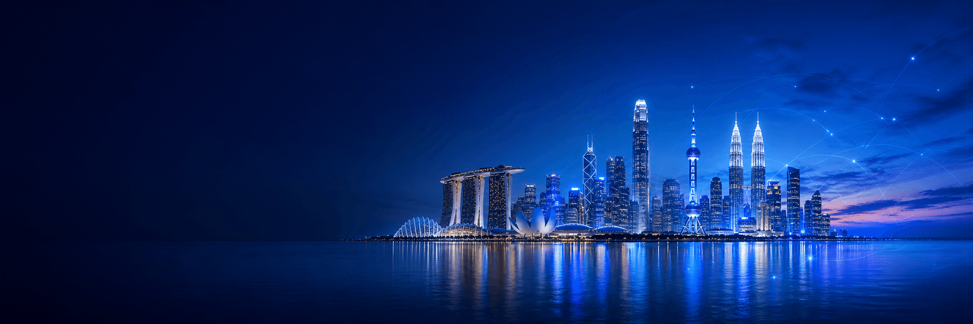 Pan-Asia city skyline at night with Marina Bay, towers and waterfront